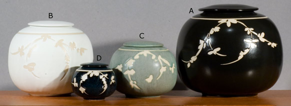4 globe urns with wax resist